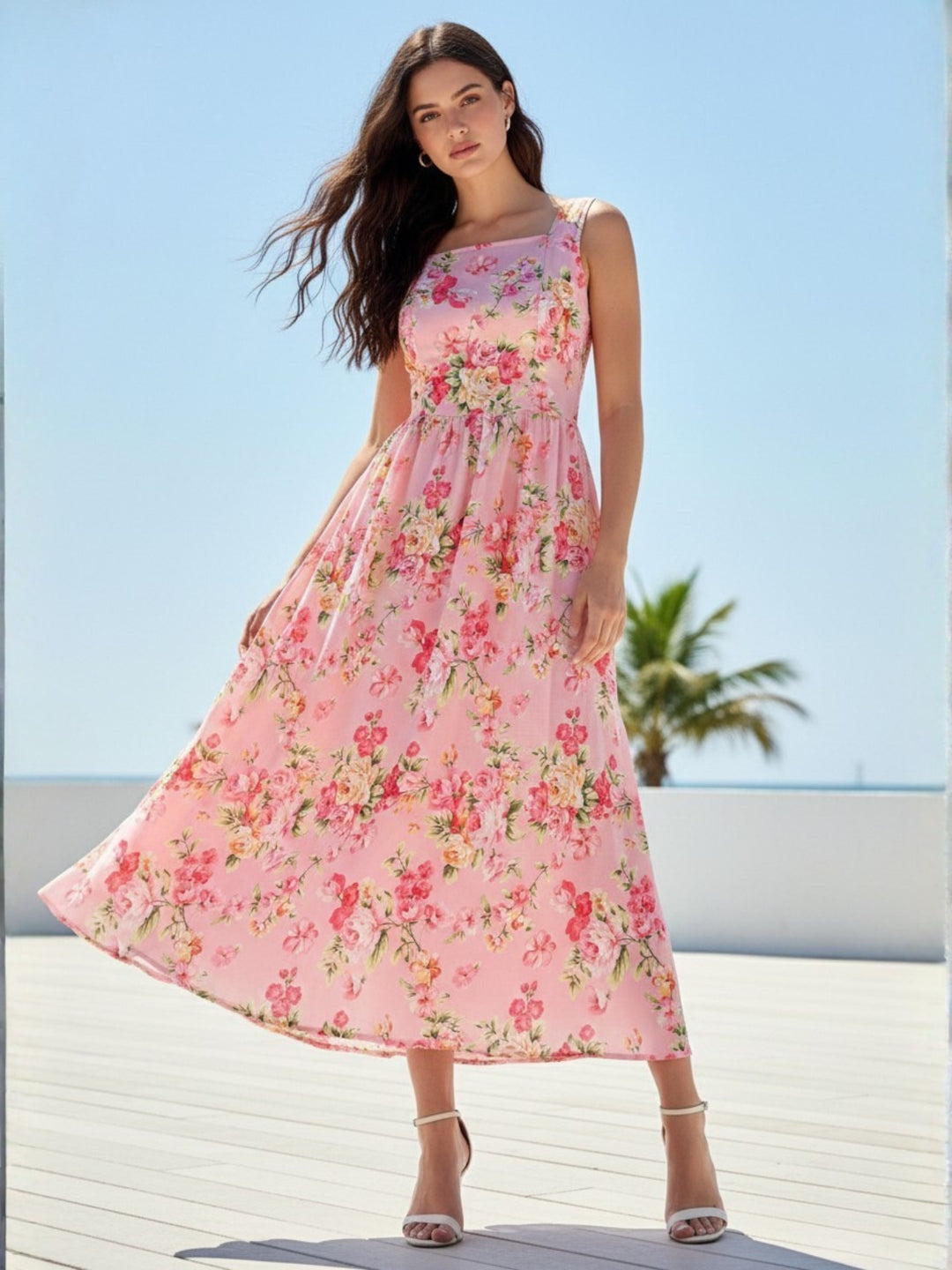 Pink Elegant Printed Midi Dress With Flowy Skirt And Back Bow Detail