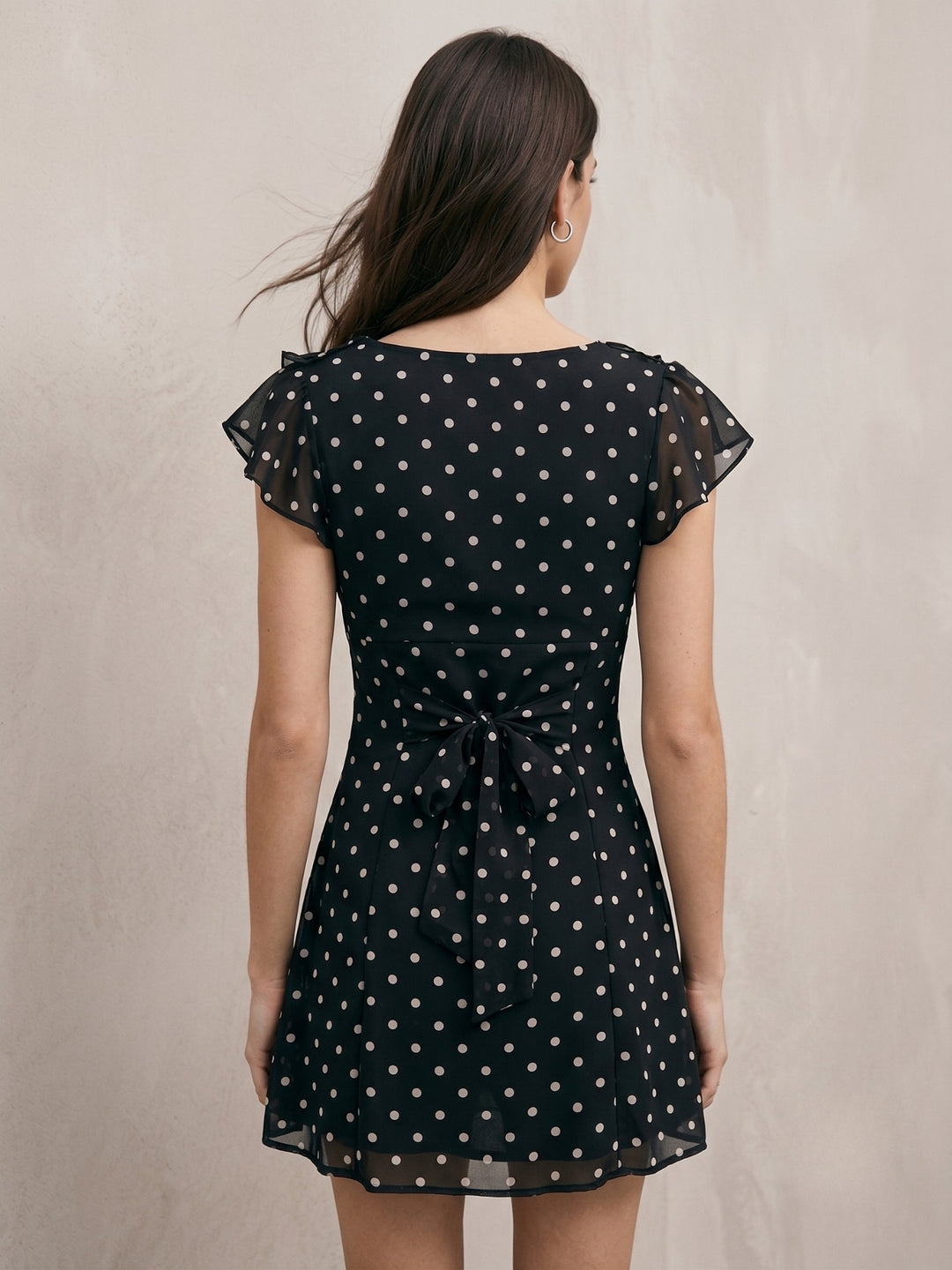 Black Plunge Neck Polka Dotted Dress With Flutter Sleeves