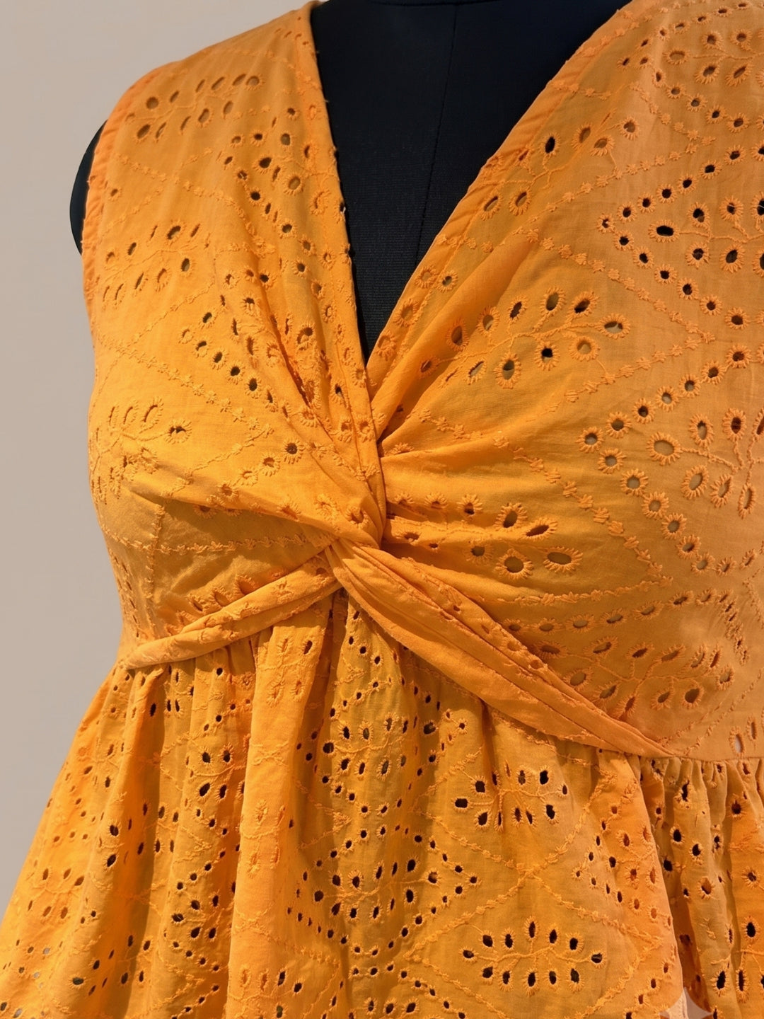 Orange Twist-Front Sleeveless Schiffli Blouse