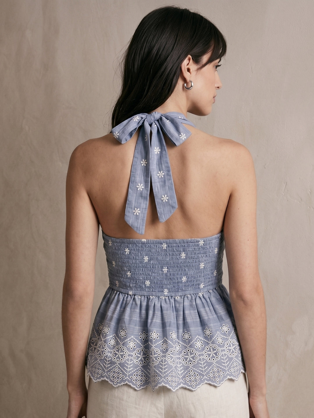 Blue Deep V-Neck Halter Style With A Backless Or Tie-Back Design