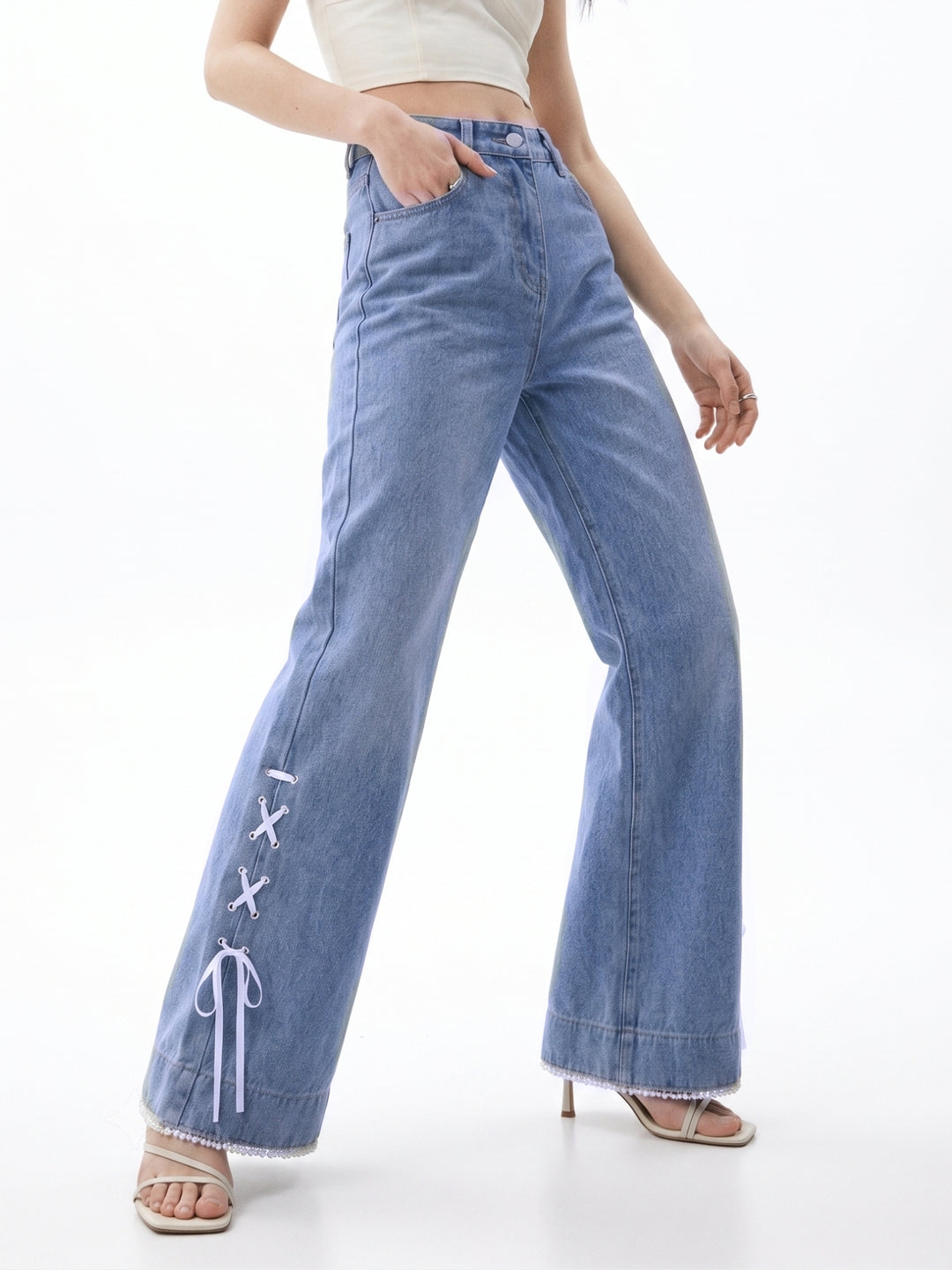 blue Tinted Baggy Jeans With Side Bow Detailing At The Hem