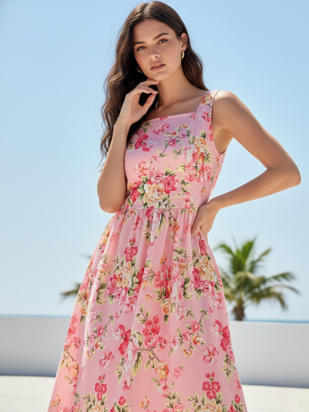 Pink Elegant Printed Midi Dress With Flowy Skirt And Back Bow Detail