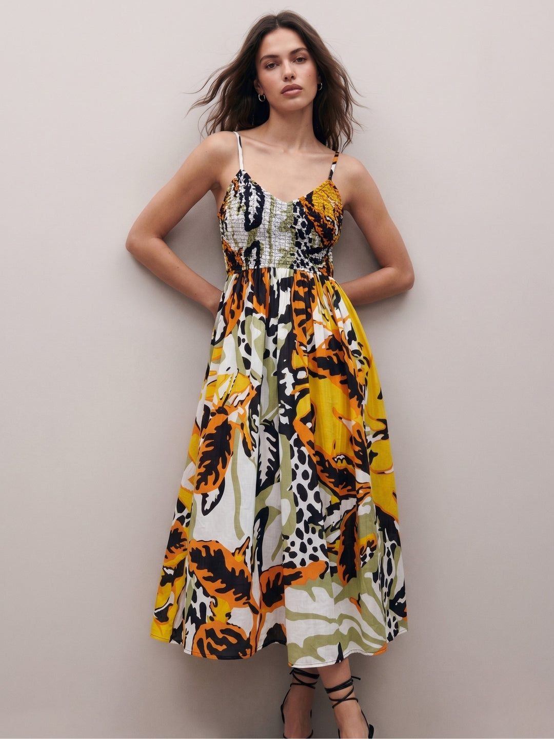 Multi Printed A-Line Silhouette With A Diamond Smocked Upper Bodice And Flowy Skirt