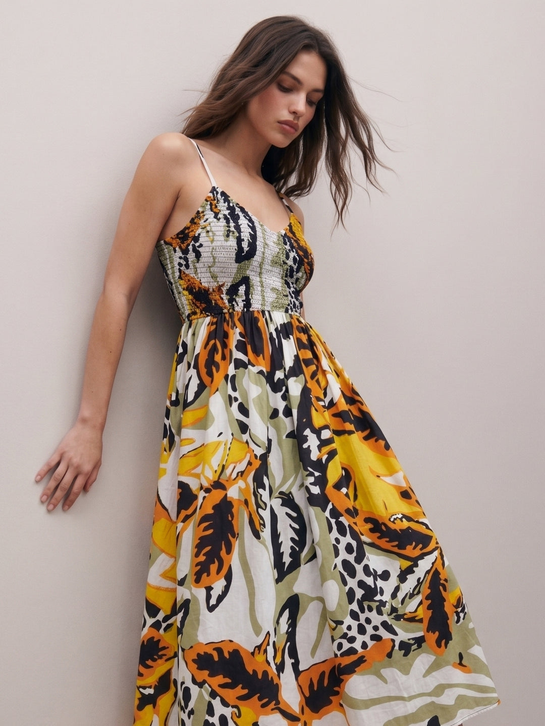 Multi Printed A-Line Silhouette With A Diamond Smocked Upper Bodice And Flowy Skirt