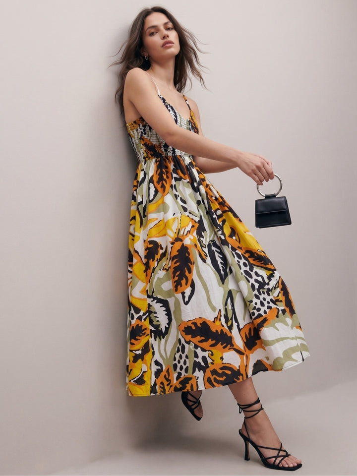 Multi Printed A-Line Silhouette With A Diamond Smocked Upper Bodice And Flowy Skirt