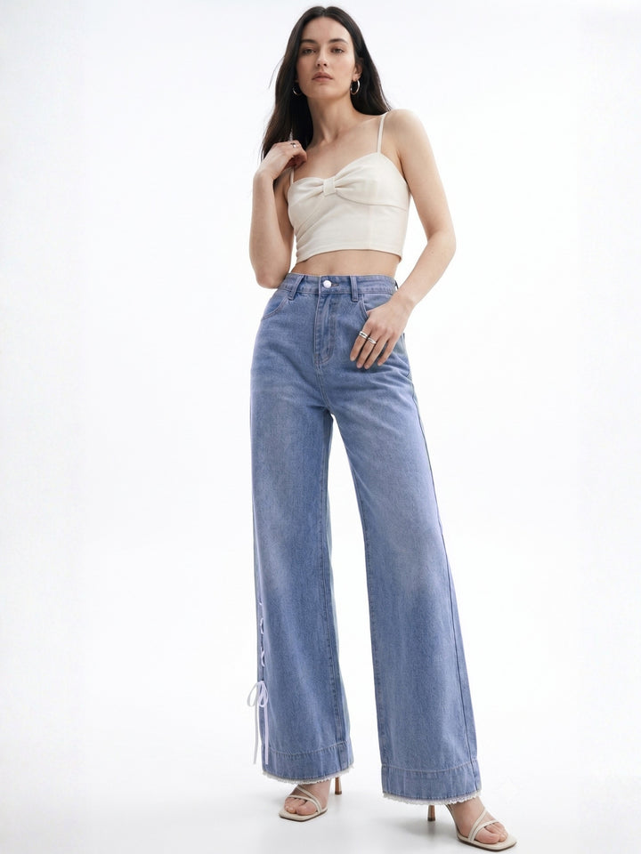 blue Tinted Baggy Jeans With Side Bow Detailing At The Hem