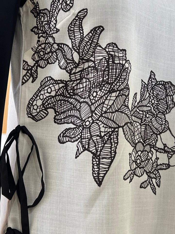 Off White Printed Floral Bouse With Tie Up Bow Detail