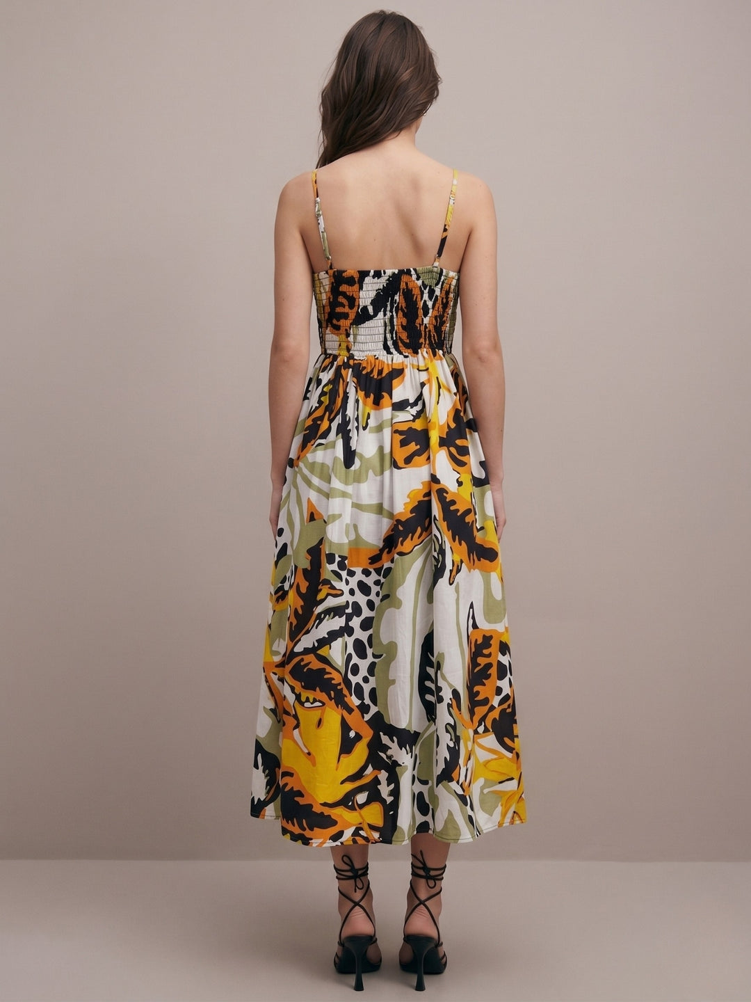 Multi Printed A-Line Silhouette With A Diamond Smocked Upper Bodice And Flowy Skirt