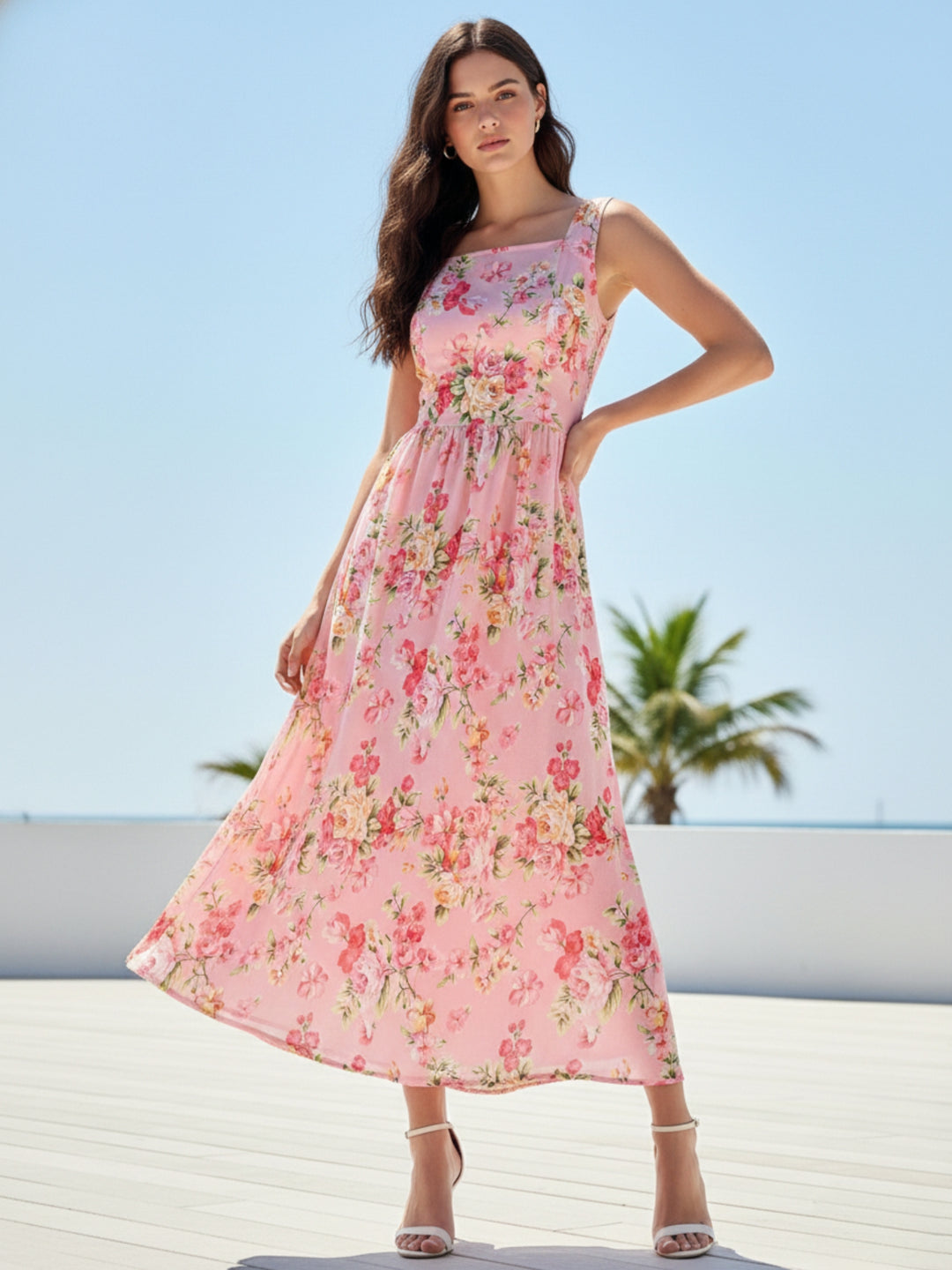 Pink Elegant Printed Midi Dress With Flowy Skirt And Back Bow Detail
