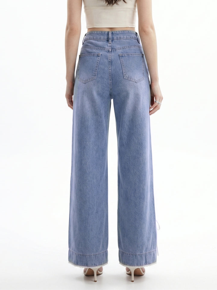 blue Tinted Baggy Jeans With Side Bow Detailing At The Hem