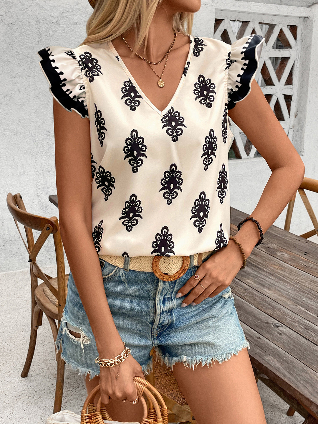 White Printed V Neck Ruffle Sleeve Top