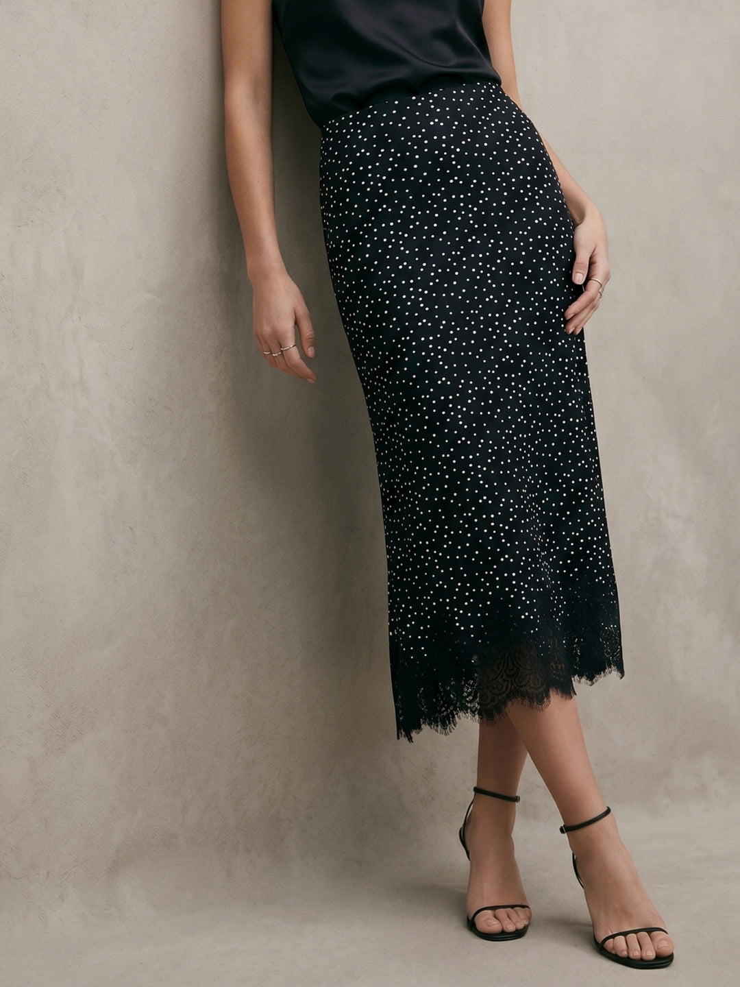 Black Midi Skirt In Polka Dot Fabric With Eyelace Lace Hem Detail