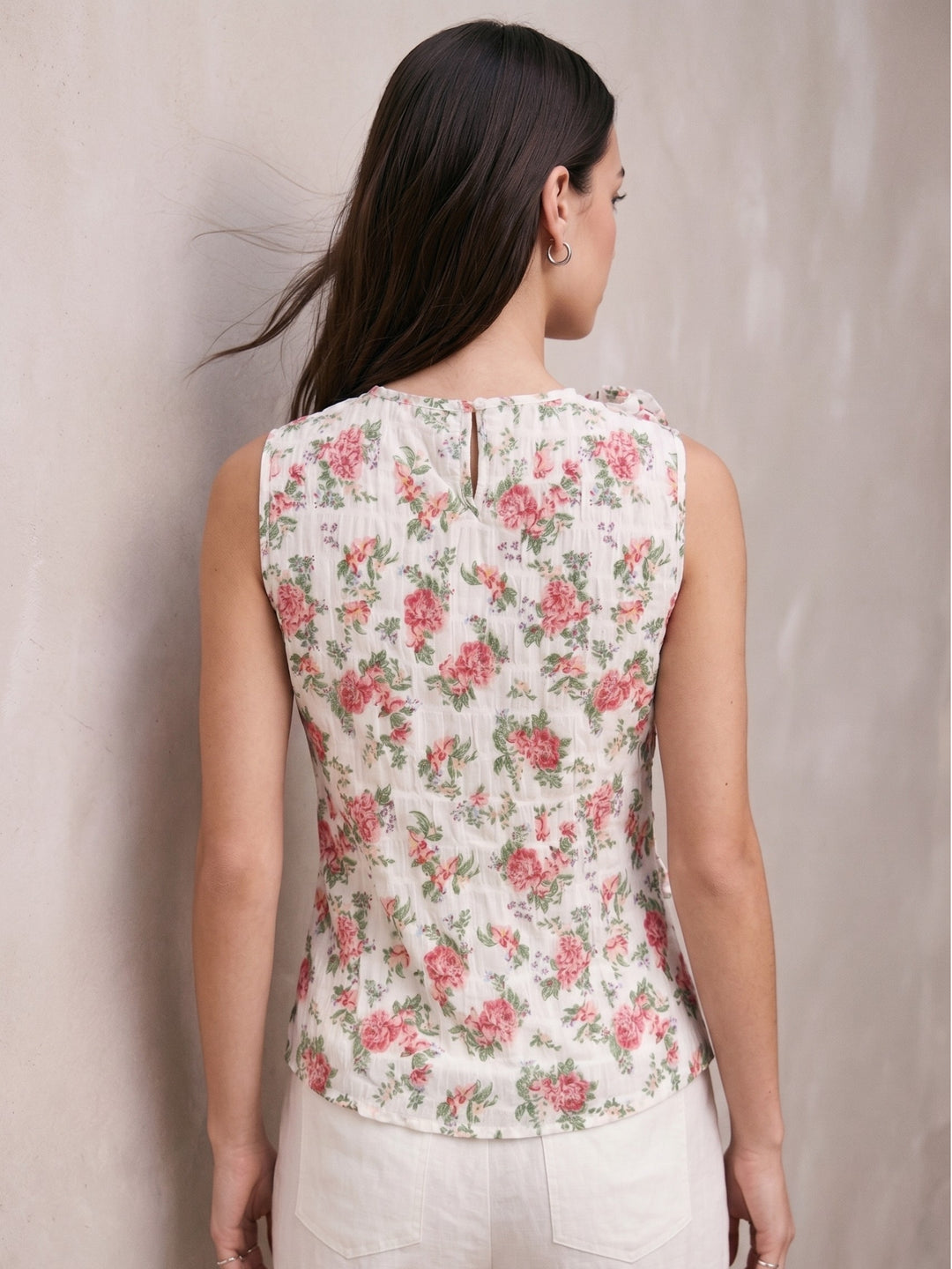 White Elegant Sleeveless Blouse With Ruffle And Corsage Detail