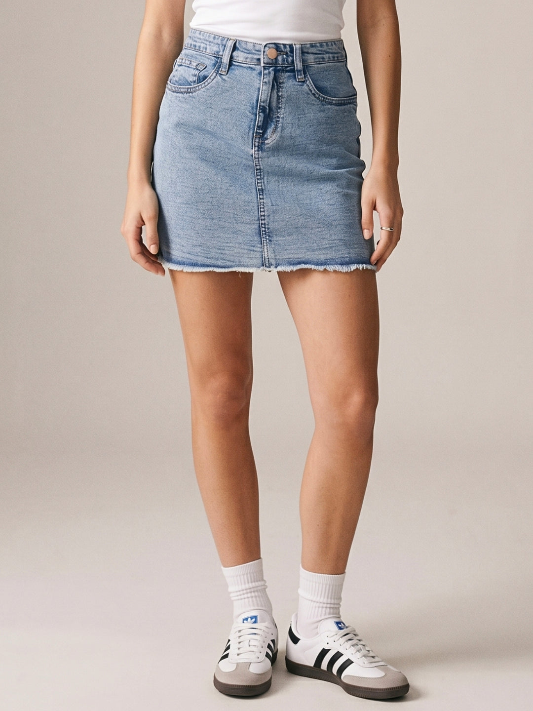 Light Blue Fitted Mini Denim Skirt With Freyed Hem