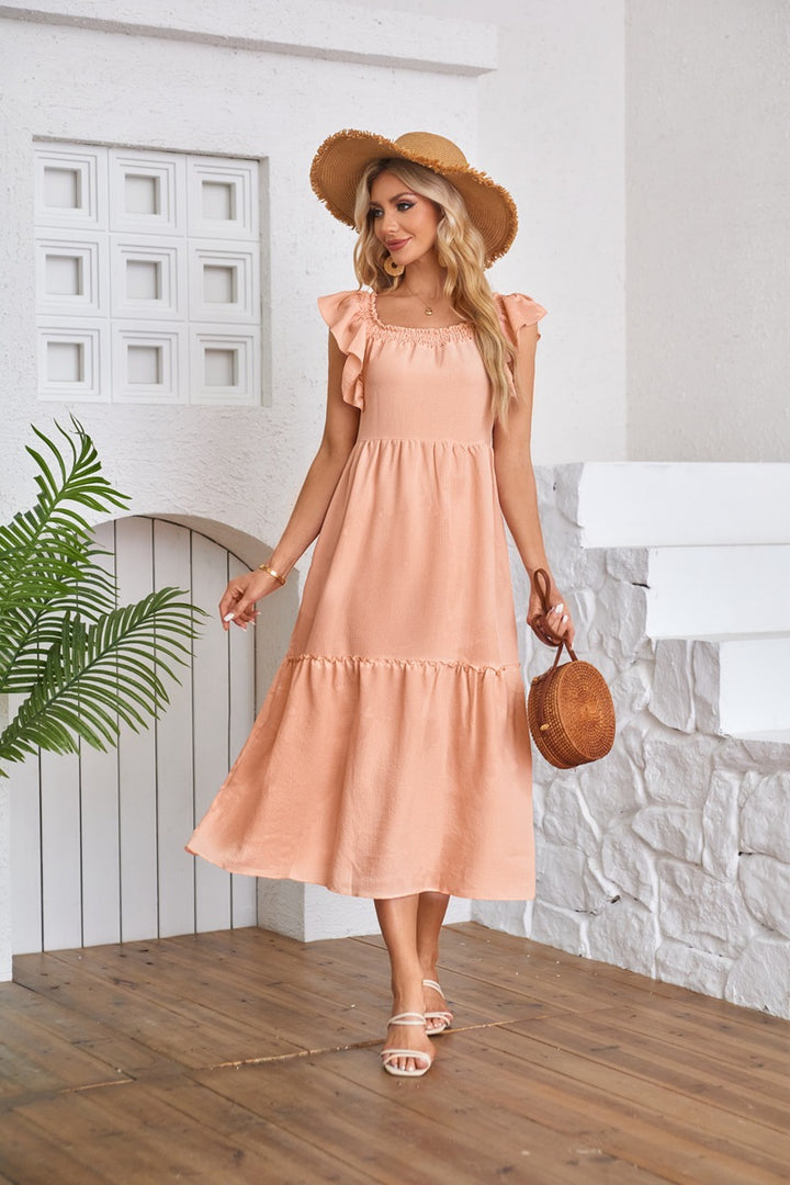 Peach Solid Flutter Sleeved Empire Waist Smocked Dress