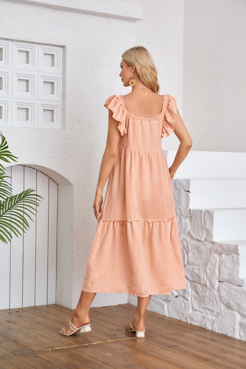 Peach Solid Flutter Sleeved Empire Waist Smocked Dress