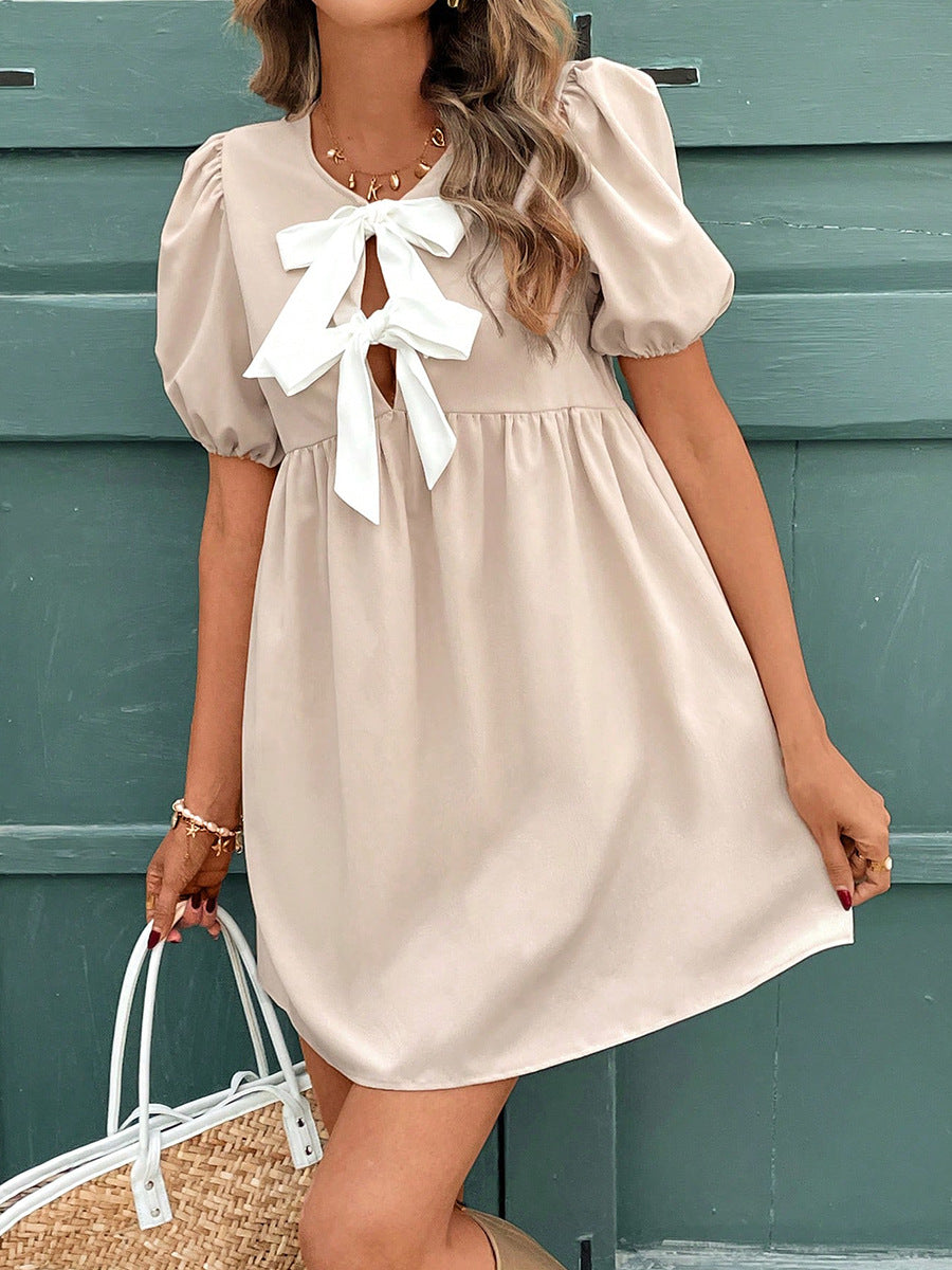 Cream Solid Shift Dress With Bow Detailing