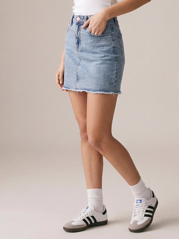 Light Blue Fitted Mini Denim Skirt With Freyed Hem