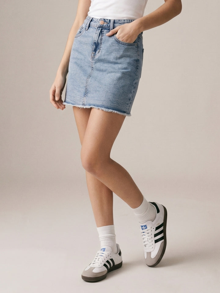 Light Blue Fitted Mini Denim Skirt With Freyed Hem